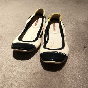 We are selling these Prada flats. made with leather. Slightly worn.